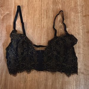 Free People bralette. Black lace with copper/gold threading detail. Size S.